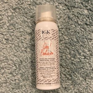 IGK smoothing spray for frizz & heat protection.